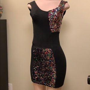 Little black dress with multi color sequence.
